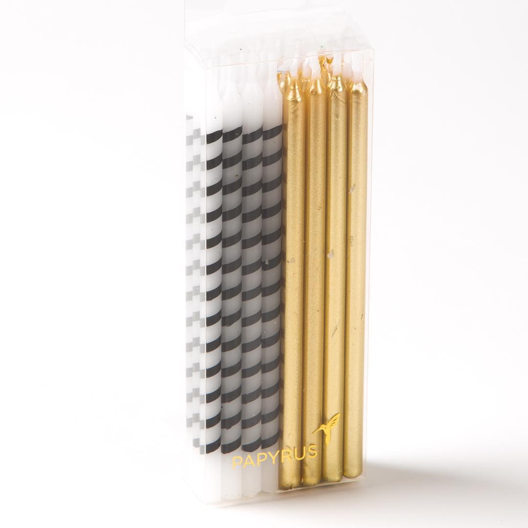 You'll find any reason to use the gold and stripped candles from our company, @papyrusbrand