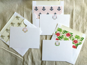 From Over the Moon, textured flat cards bear sorority crests and are paired with lined envelopes. 