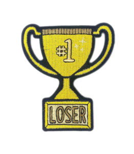 #1 Loser Trophy Patch is from Pinky Weber